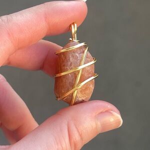 Orange Calcite Gold Tone Wire Wrap Pendant